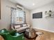 Inviting living room with hardwood floors, contemporary furniture, and streaming sunlight at 4232 Jason St # 7, Denver, CO 80211