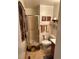 This is a well-appointed bathroom featuring a glass-enclosed shower and updated fixtures at 1419 S Terry St, Longmont, CO 80501