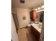 Bathroom featuring a vanity with storage, a toilet, and a shower/tub combination for convenience at 1419 S Terry St, Longmont, CO 80501