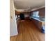A kitchen featuring wood cabinets, a black refrigerator, and a stainless steel sink at 1419 S Terry St, Longmont, CO 80501
