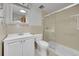 Neutral bathroom features a shower with sliding glass doors at 2826 S Lamar St, Denver, CO 80227