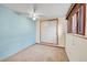 Cozy bedroom with a closet and a window allowing for natural light at 2826 S Lamar St, Denver, CO 80227