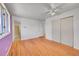 Large bedroom with hardwood floors and plenty of closet space at 2826 S Lamar St, Denver, CO 80227