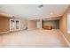 Expansive basement offers ample space, neutral carpet and convenient wet bar area at 21107 Hawthorne Ln, Parker, CO 80138
