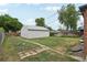 Flat backyard featuring a stone trail and wooden fence at 3285 S Delaware St, Englewood, CO 80110