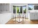 Eat in kitchen with a small table, view of large bay window, and great natural lighting at 5853 S Havana Ct, Englewood, CO 80111