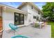 Exterior patio with a modern outdoor dining set perfect for outdoor relaxation and entertainment at 5853 S Havana Ct, Englewood, CO 80111