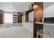 Walk-in closet featuring wood shelving and natural light at 5853 S Havana Ct, Englewood, CO 80111