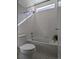 Clean bathroom with tiled shower and tub combination, featuring bright natural light and modern fixtures at 13788 Umatilla Ln, Broomfield, CO 80023