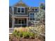 Charming two-story home featuring a cozy front porch and well-manicured landscaping at 13788 Umatilla Ln, Broomfield, CO 80023