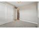 Cozy bedroom with carpet flooring, neutral walls, and a closet at 1660 Candleflower Dr, Castle Pines, CO 80108