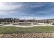 Outdoor common area featuring lounge chairs, fire pit, and covered seating with scenic views at 1660 Candleflower Dr, Castle Pines, CO 80108