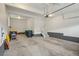 Clean, spacious garage with painted walls, overhead door, and ample storage space at 1660 Candleflower Dr, Castle Pines, CO 80108