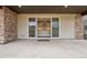 Covered patio with access to the home's interior, offering seamless indoor-outdoor living at 1660 Candleflower Dr, Castle Pines, CO 80108