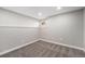 Neutral bedroom offering a blank canvas for personalization, featuring neutral carpet and gray walls at 8712 W 64Th Way, Arvada, CO 80004