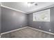 This bedroom features gray walls and neutral carpet providing a blank canvas for customization at 8712 W 64Th Way, Arvada, CO 80004