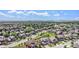 Aerial view of a neighborhood showcasing homes and surrounding landscape at 7242 E 133Rd Cir, Thornton, CO 80602