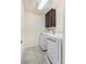 Laundry room with side by side washer and dryer, and upper cabinets at 7242 E 133Rd Cir, Thornton, CO 80602