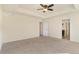 Bright and airy main bedroom with carpet and ceiling fan at 7242 E 133Rd Cir, Thornton, CO 80602