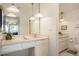 Bathroom featuring marble countertops, ample lighting, and neutral-colored walls for a soothing feel at 1200 N Humboldt St # 1406, Denver, CO 80218