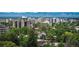 Panoramic city view of buildings and greenery with mountains in the distance at 1200 N Humboldt St # 1406, Denver, CO 80218