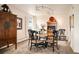 Elegant dining room with a round table, striking light fixture, and nearby terrace at 1200 N Humboldt St # 1406, Denver, CO 80218