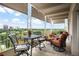 Beautiful terrace with seating, flowers and city and golf course views at 1200 N Humboldt St # 1406, Denver, CO 80218