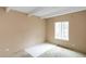 Bedroom with a neutral paint and a sunny window at 9995 E Harvard Ave # 257, Denver, CO 80231