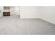 Spacious finished basement with gray carpet and wet bar, perfect for entertaining and recreation at 863 S Race St, Denver, CO 80209