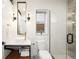 Contemporary bathroom featuring a glass-enclosed shower, vessel sink, and sleek fixtures at 863 S Race St, Denver, CO 80209