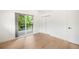 Bright bedroom with a sliding glass door to private balcony and large closet at 863 S Race St, Denver, CO 80209