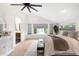 Bright bedroom with an ensuite bathroom and large windows at 863 S Race St, Denver, CO 80209