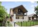 Stylish two-story home featuring a contemporary design with a balcony and well-maintained landscaping at 863 S Race St, Denver, CO 80209