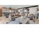 Open concept living room and kitchen with modern furnishings and natural light at 863 S Race St, Denver, CO 80209