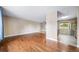 Spacious open concept living room with hardwood flooring and plenty of natural light at 8051 S Kendall Blvd, Littleton, CO 80128