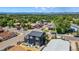 A stunning aerial view showcases the modern home and its desirable neighborhood at 550 S Raleigh St, Denver, CO 80219