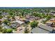 Neighborhood aerial view with lush trees, charming homes, and convenient street access at 550 S Raleigh St, Denver, CO 80219