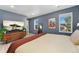This spacious bedroom is decorated with modern decor, wood floors, and natural light at 550 S Raleigh St, Denver, CO 80219