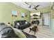 Living room area features a comfortable seating arrangement and television at 550 S Raleigh St, Denver, CO 80219