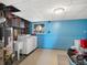 Functional basement laundry area with washer, dryer, and utility sink at 10536 Garrison St, Westminster, CO 80021