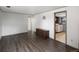 Finished basement offers laminate floors, paneled walls and neutral colors and a laundry closet at 10536 Garrison St, Westminster, CO 80021