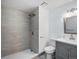 Remodeled bathroom featuring tiled shower and modern vanity at 10536 Garrison St, Westminster, CO 80021