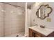 Updated bathroom featuring a stylish vanity and a tiled shower at 6900 S Clermont St, Centennial, CO 80122