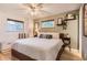 Comfortable bedroom with built-in bench and inviting decor at 6900 S Clermont St, Centennial, CO 80122