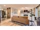 Open living space featuring a fireplace, built-in shelving, and modern furnishings at 6900 S Clermont St, Centennial, CO 80122