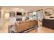 Bright living room with fireplace, built-in shelving, and a large window view at 6900 S Clermont St, Centennial, CO 80122