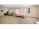 Finished basement with a convertible bed, comfortable seating, and a cozy carpet at 2558 Northview Pl, Castle Rock, CO 80104