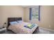 Bedroom featuring a bed with patterned bedding and a window that provides natural light at 2558 Northview Pl, Castle Rock, CO 80104
