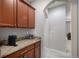 Butler's pantry with beautiful cabinets, granite countertops, and wine rack at 2558 Northview Pl, Castle Rock, CO 80104