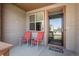 Inviting front porch with seating, offering a cozy spot to relax and enjoy the neighborhood at 2558 Northview Pl, Castle Rock, CO 80104